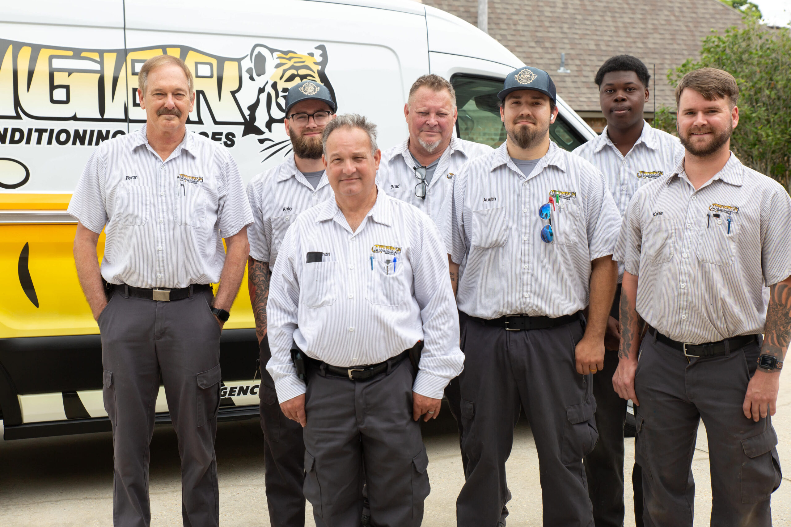 Tiger Air Conditioning team standing together